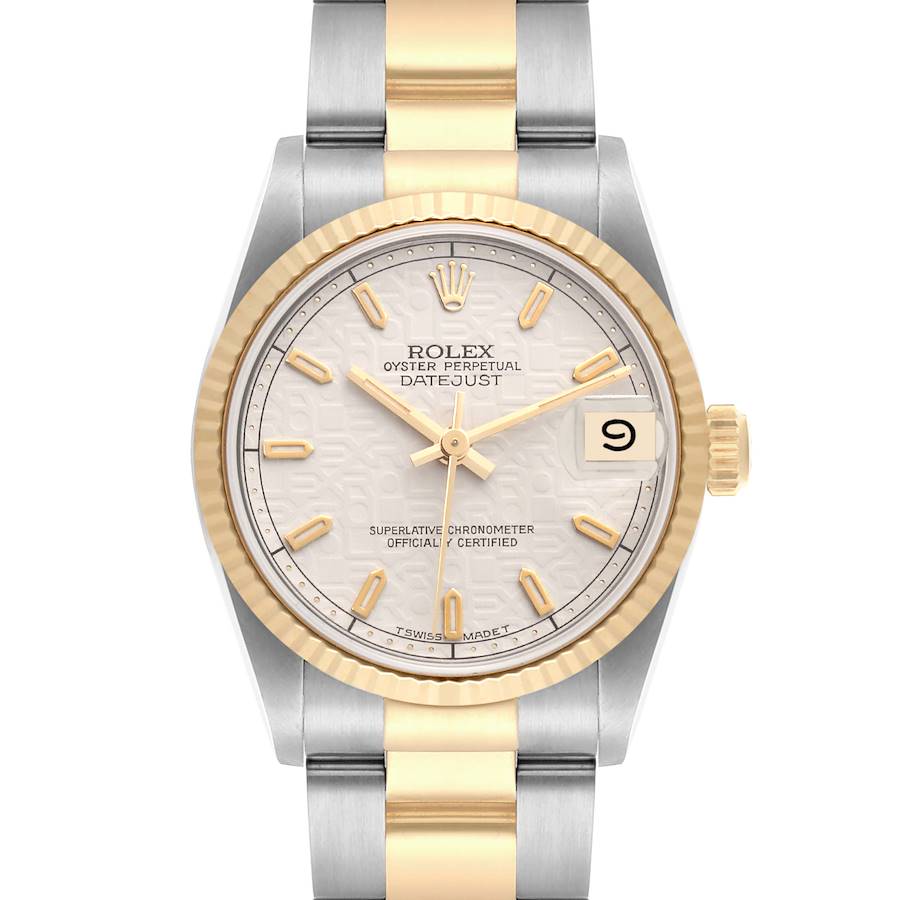 The Rolex Mid-Size watch is shown from the front, displaying the dial, bezel, bracelet, and date window clearly.